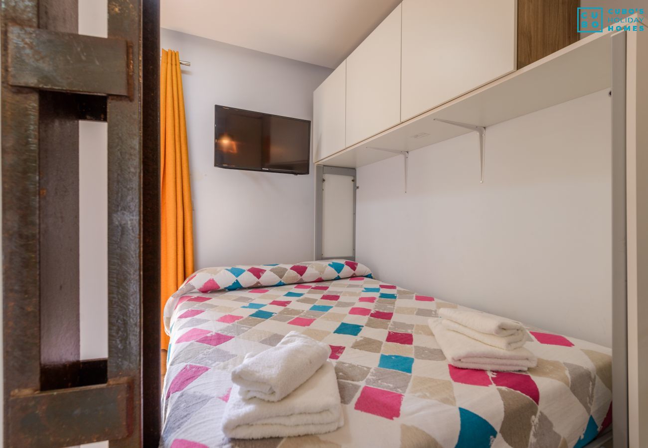 Dormitorio de este apartamento en Benalmádena