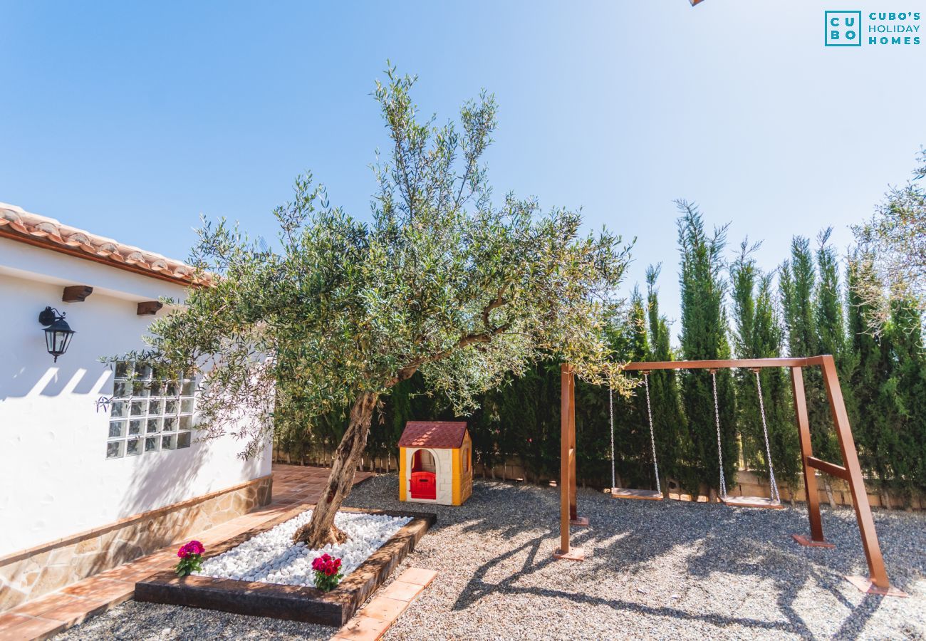 Zona de juego de esta casa rural en Alhaurín el Grande