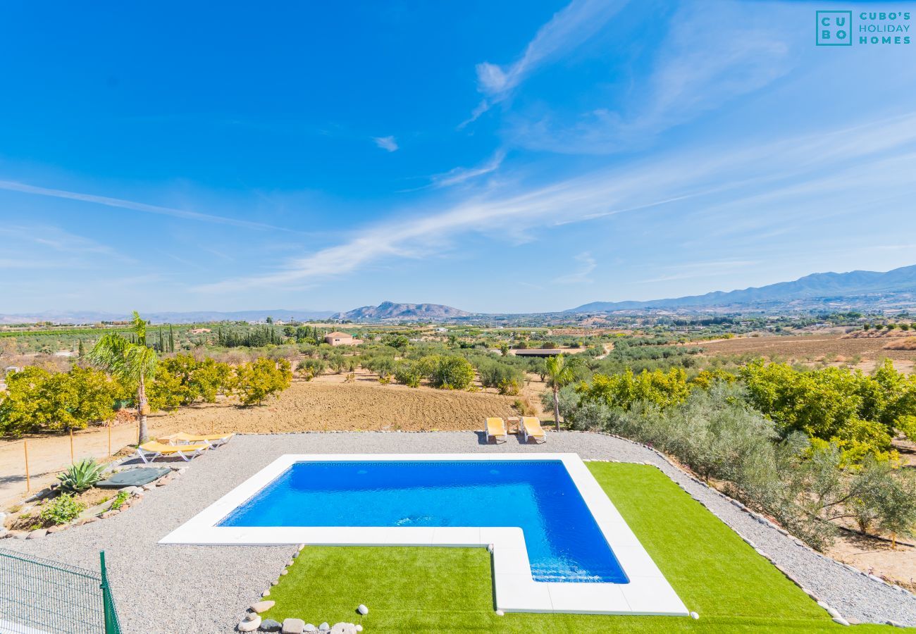 Piscina privada de este chalet en Coín