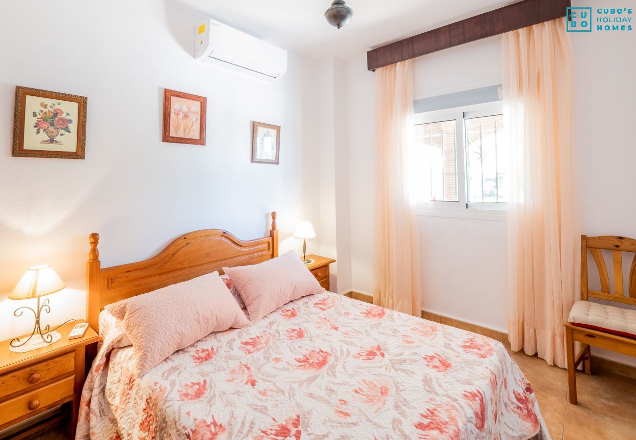 Dormitorio de esta casa rural en Alhaurín el Grande