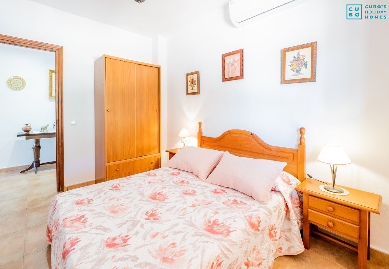 Dormitorio de esta casa rural en Alhaurín el Grande