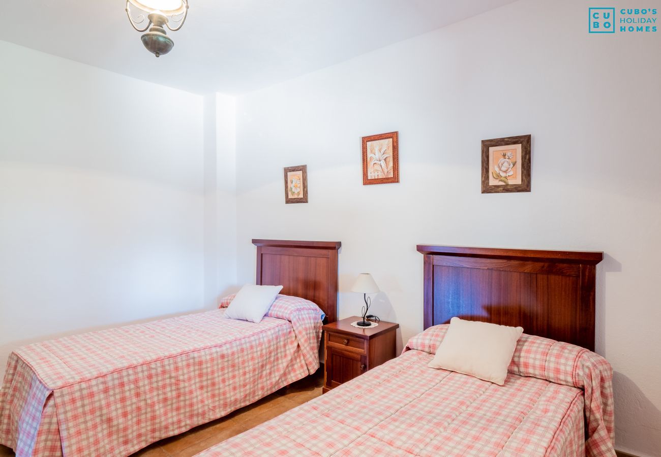 Dormitorio de esta casa rural en Alhaurín el Grande