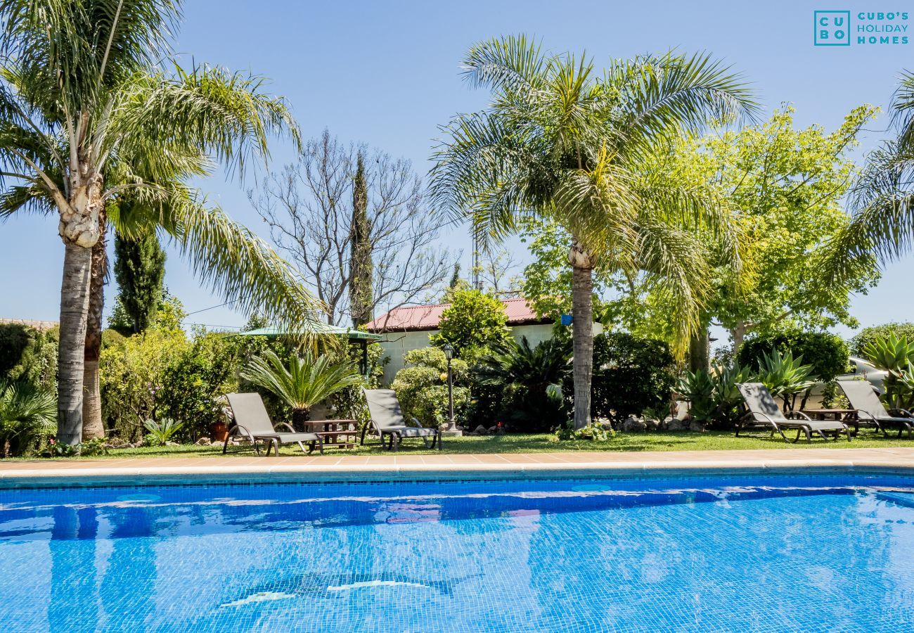 Jardín de esta casa rural en Alhaurín el Grande