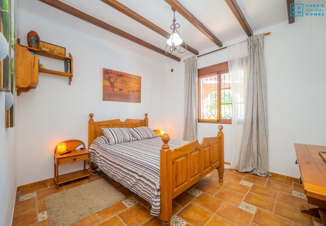 Dormitorio de esta casa rural en Alhaurín el Grande