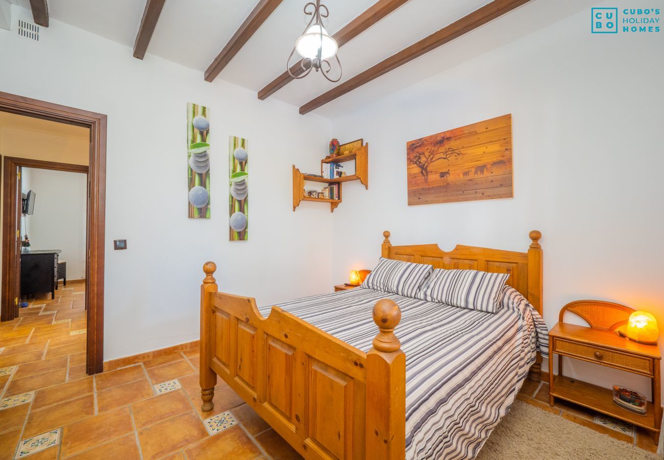 Dormitorio de esta casa rural en Alhaurín el Grande