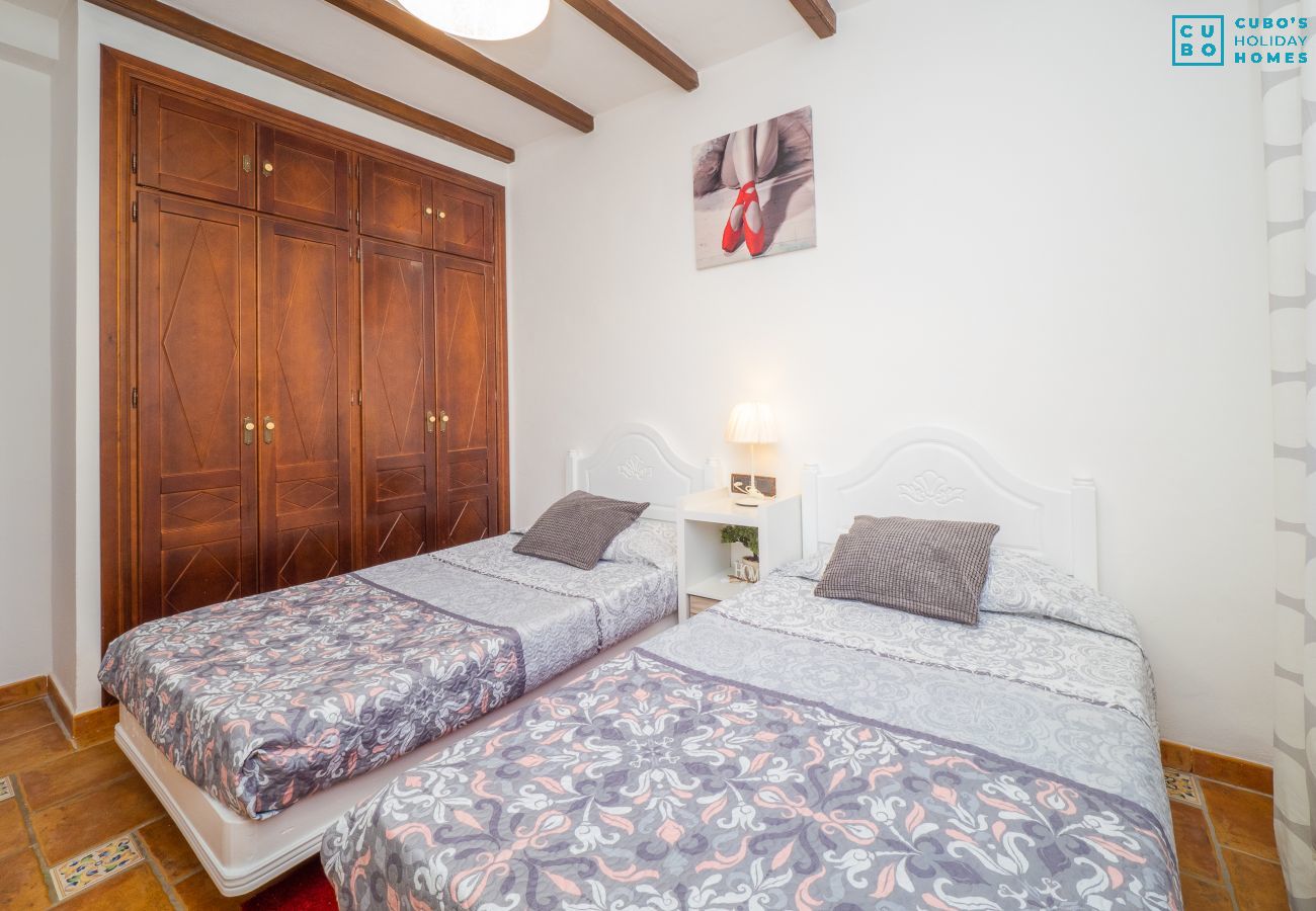 Dormitorio de esta casa rural en Alhaurín el Grande