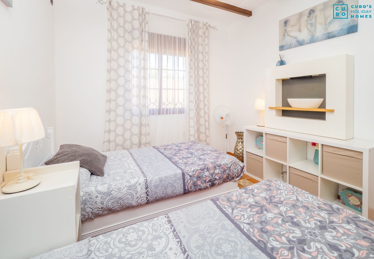 Dormitorio de esta casa rural en Alhaurín el Grande