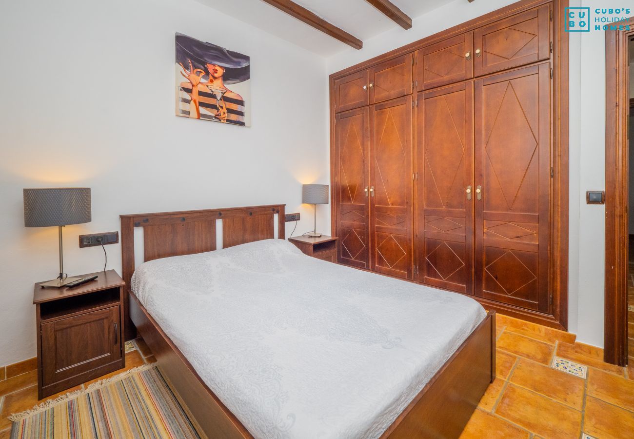 Dormitorio de esta casa rural en Alhaurín el Grande