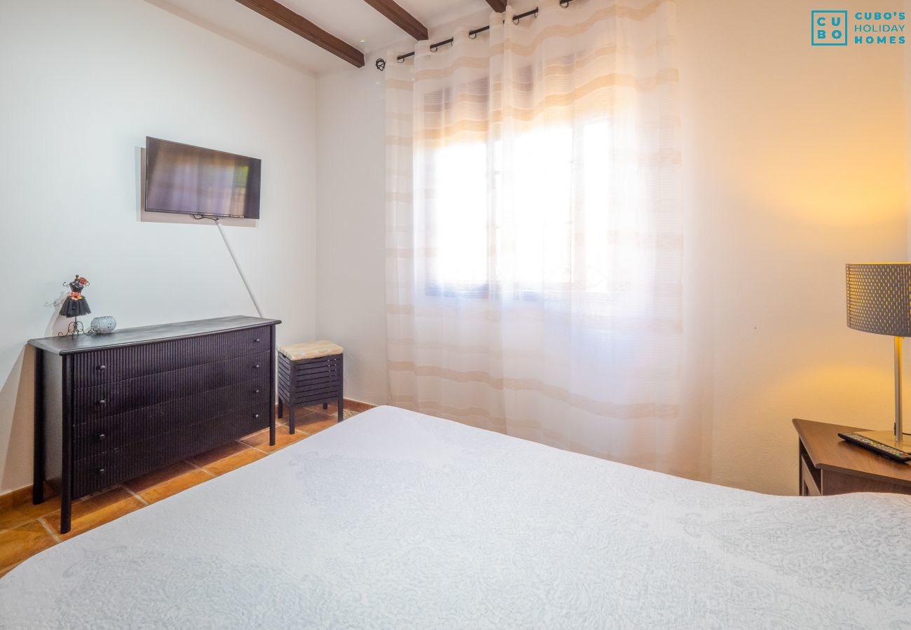 Dormitorio de esta casa rural en Alhaurín el Grande