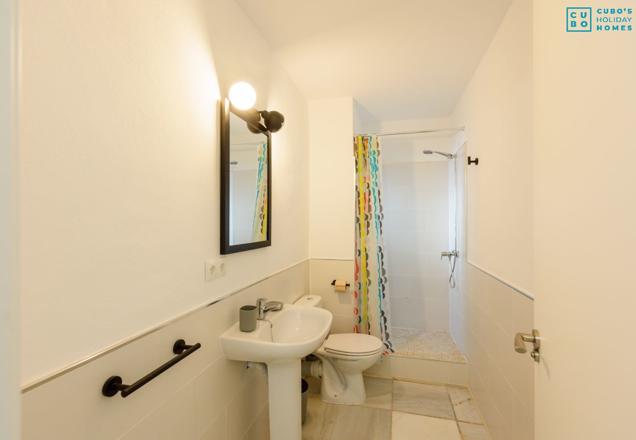Dormitorio de esta casa rural en Cártama