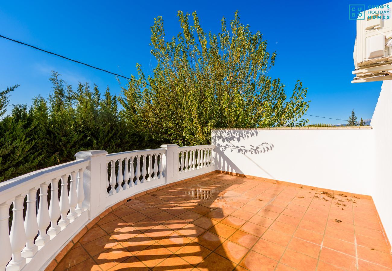 Terraza de esta casa rural en Cártama
