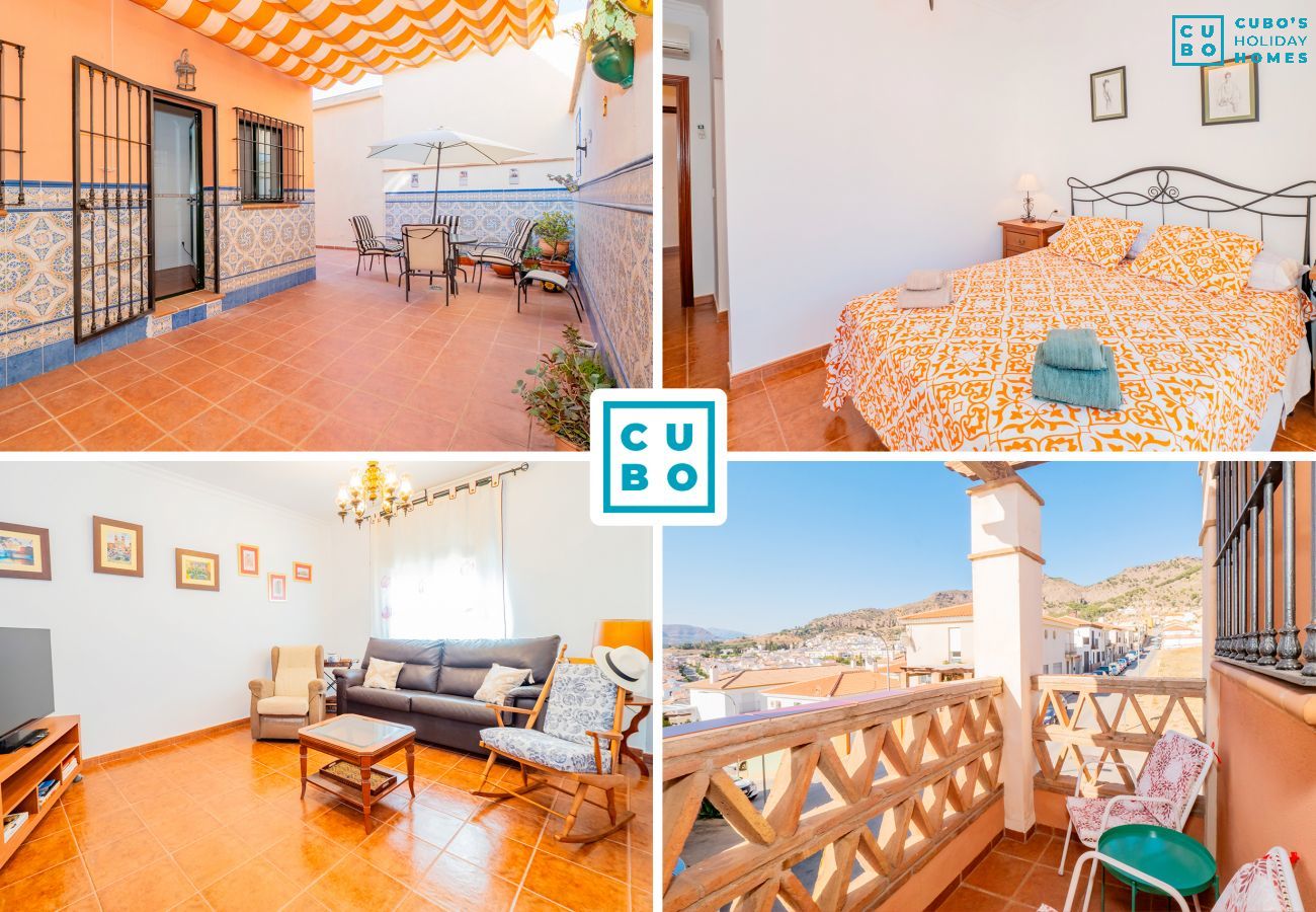 Encantadora casa vacacional con patio y terraza en Pizarra