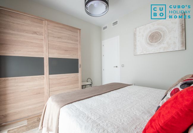 Bedroom of this apartment in the center of Alhaurín el Grande