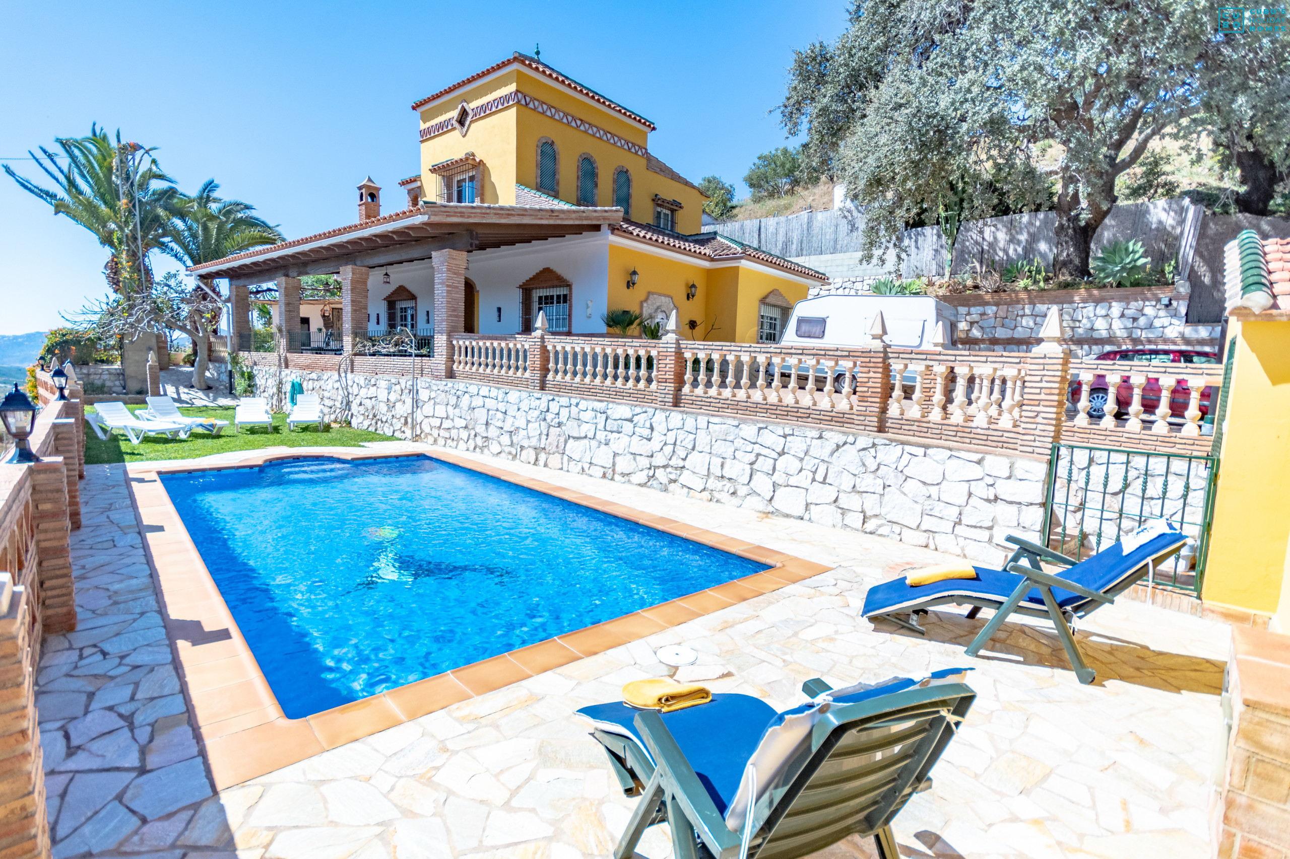 Pool and outdoor terrace of this Villa in Mijas