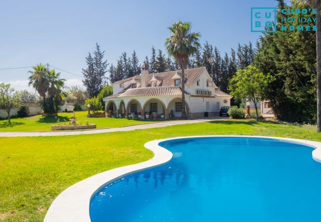 Outdoor gardens and pool of the Villa Garden