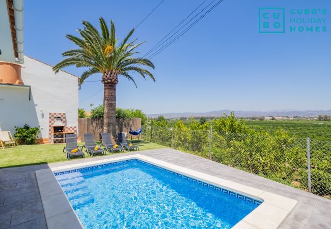 Swimming pool of the charming rural house situated in Alhaurín de la torre