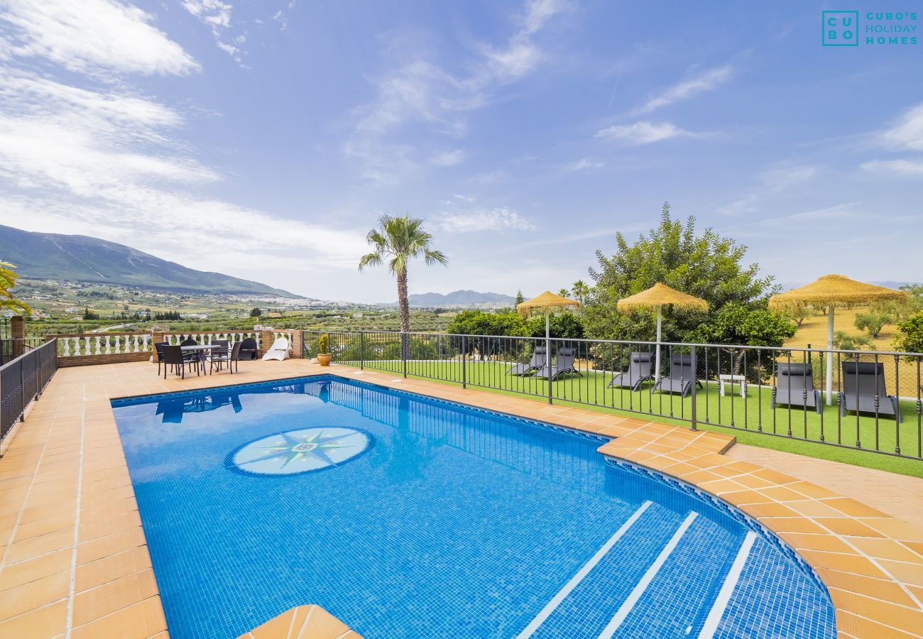 Pool and exterior of the property