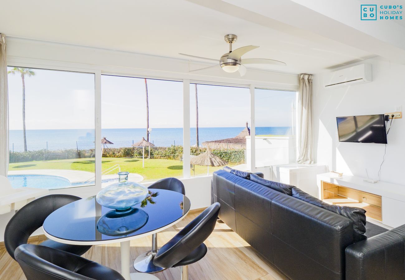 General view of living room with views of the sea 