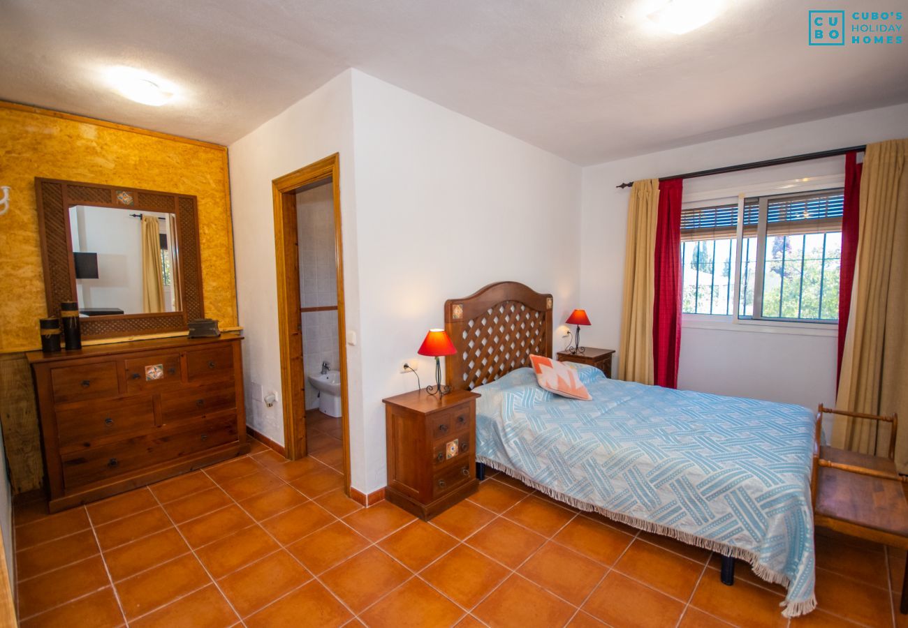 Bedroom of this rural house in Coín