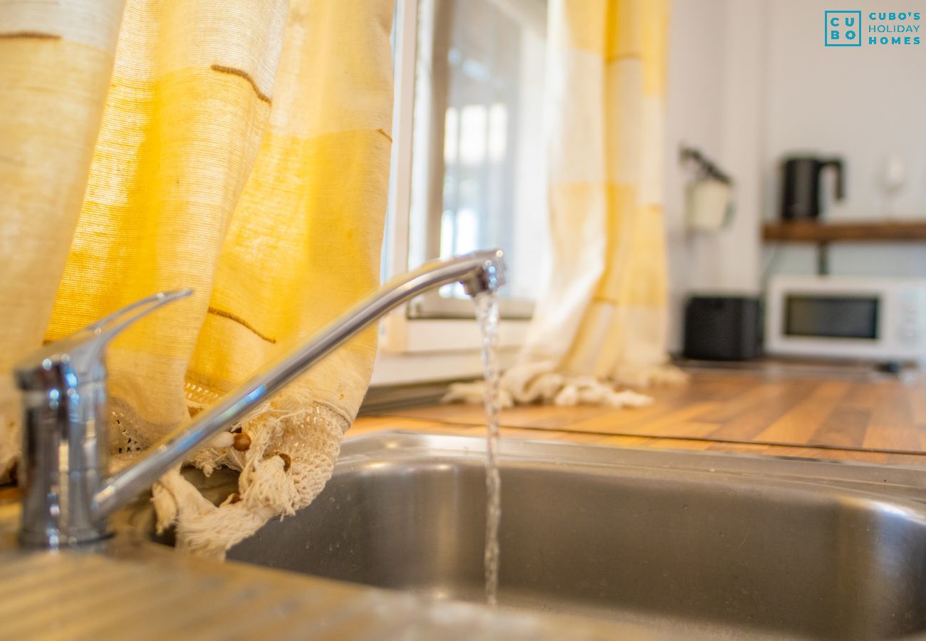 Kitchen of this rural house in Coín