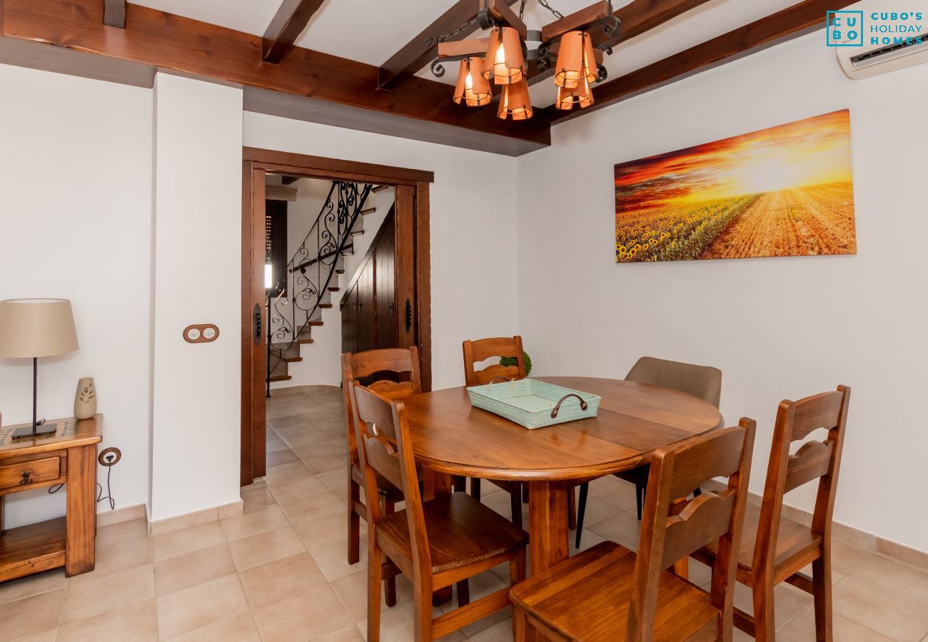 Dining room with fireplace in this house in El Torcal