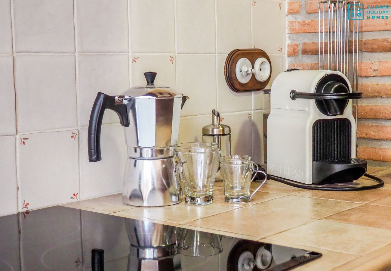 Kitchen of this house with fireplace in El Torcal