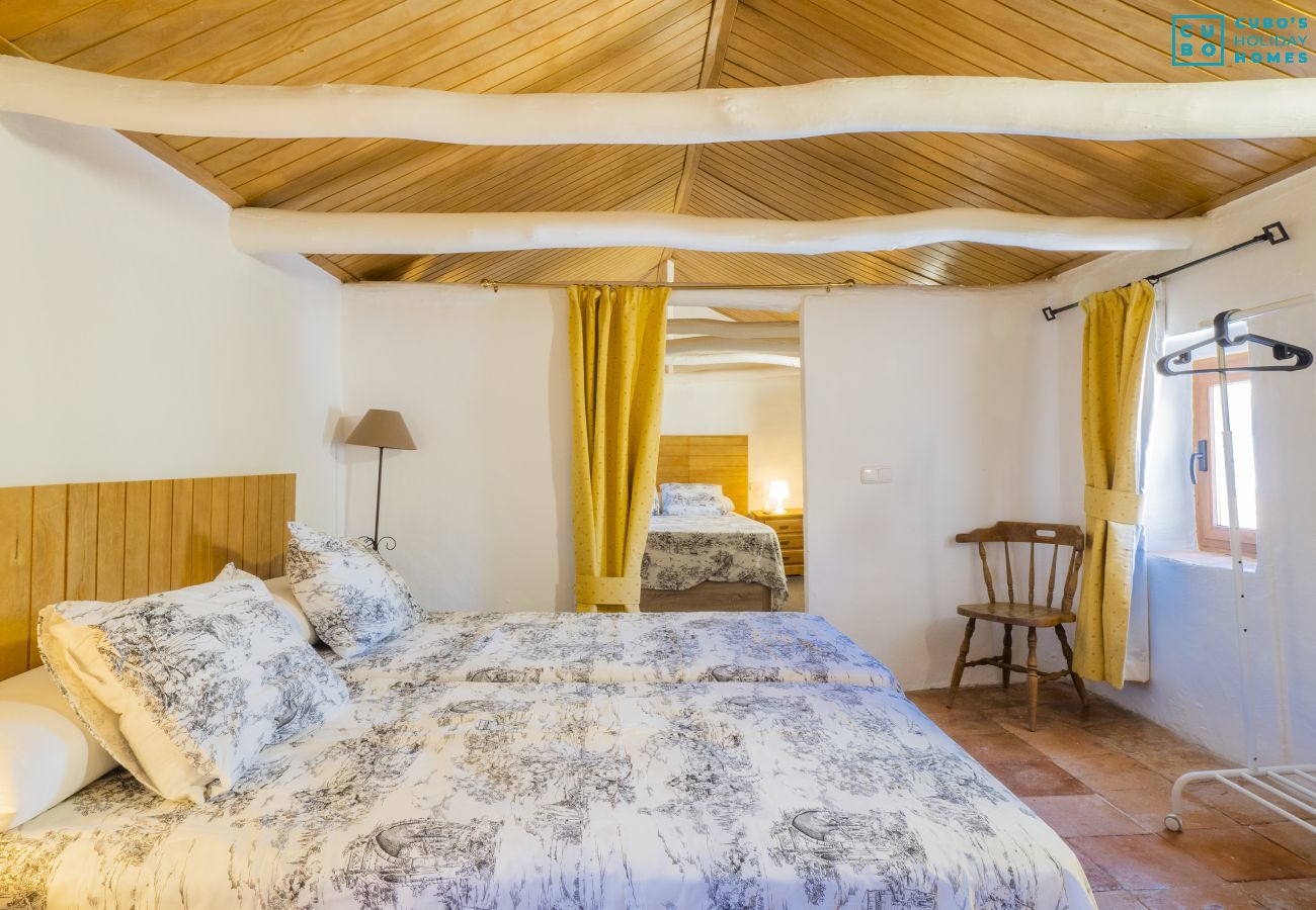 Bedroom of this farm in Coín