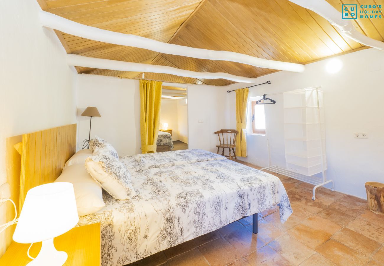 Bedroom of this farm in Coín