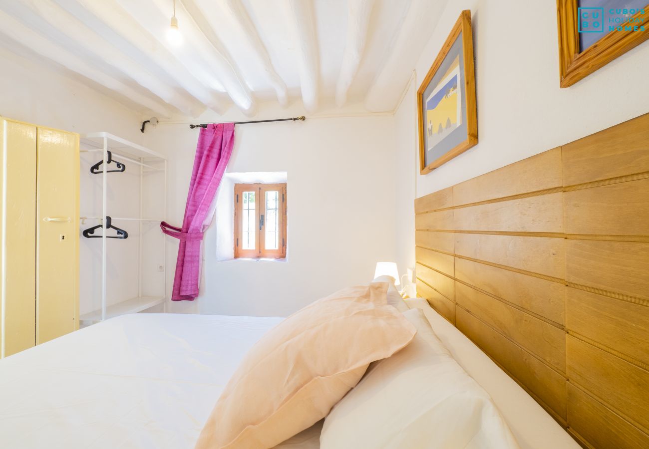 Bedroom of this farm in Coín