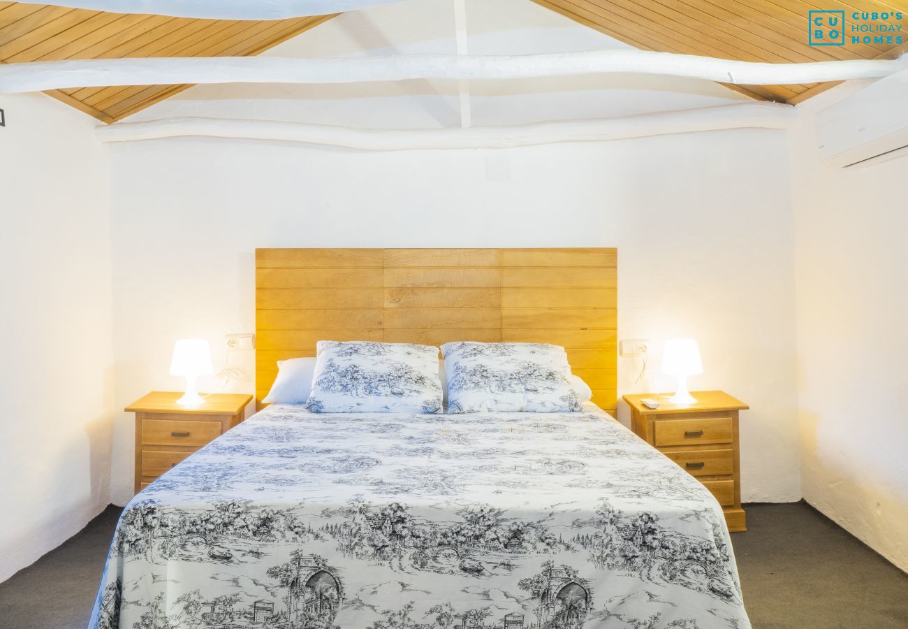 Bedroom of this farm in Coín