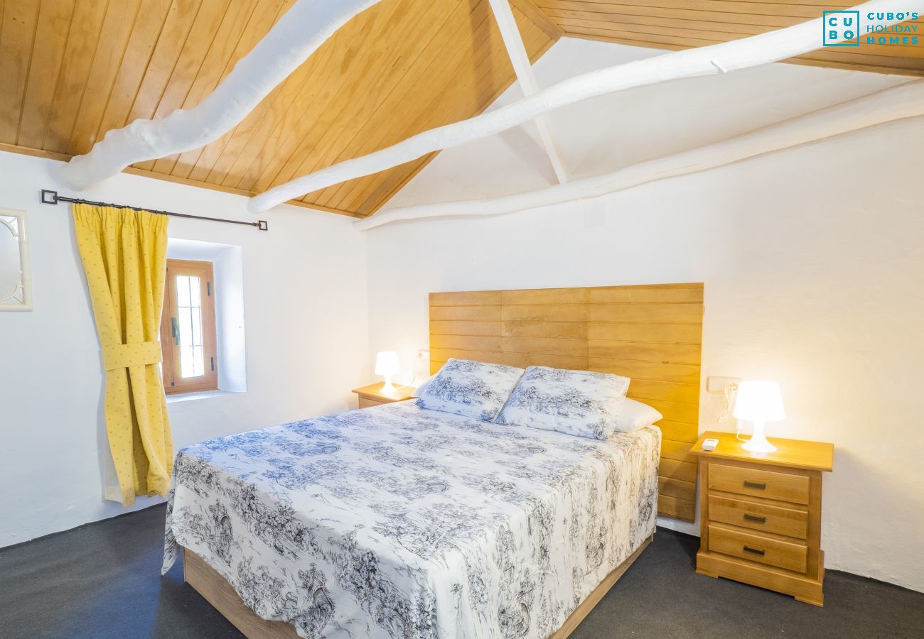 Bedroom of this farm in Coín