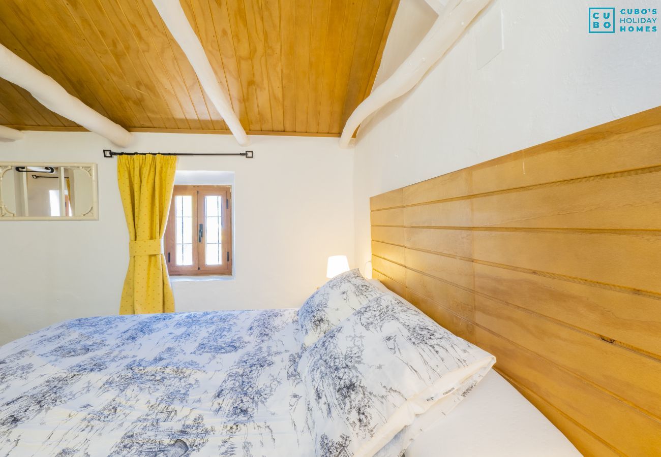 Bedroom of this farm in Coín