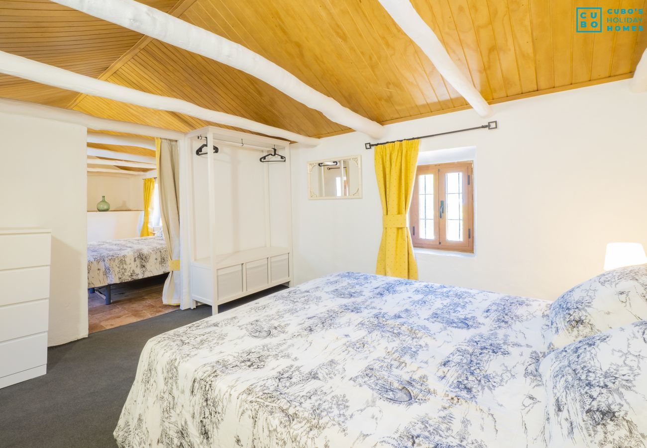 Bedroom of this farm in Coín