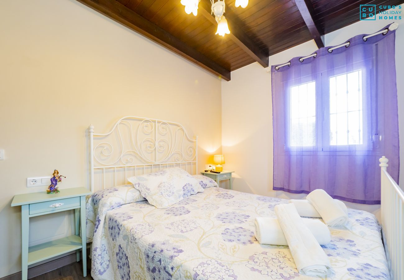 Bedroom of this rural house in Pizarra