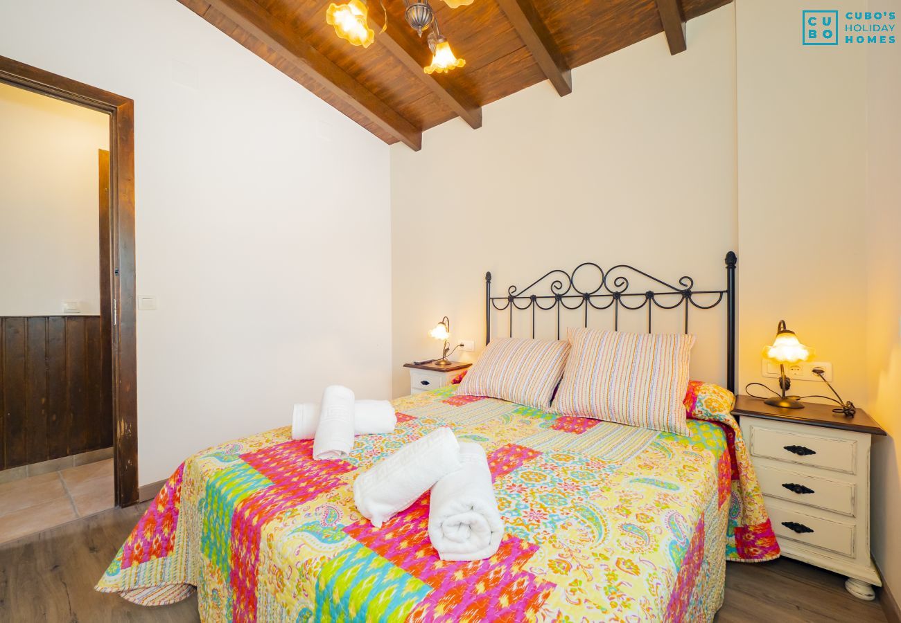 Bedroom of this rural house in Pizarra