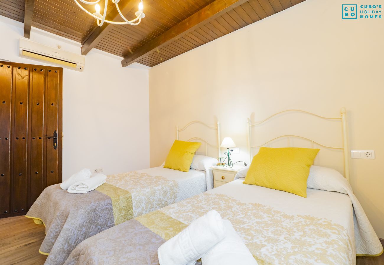 Bedroom of this rural house in Pizarra