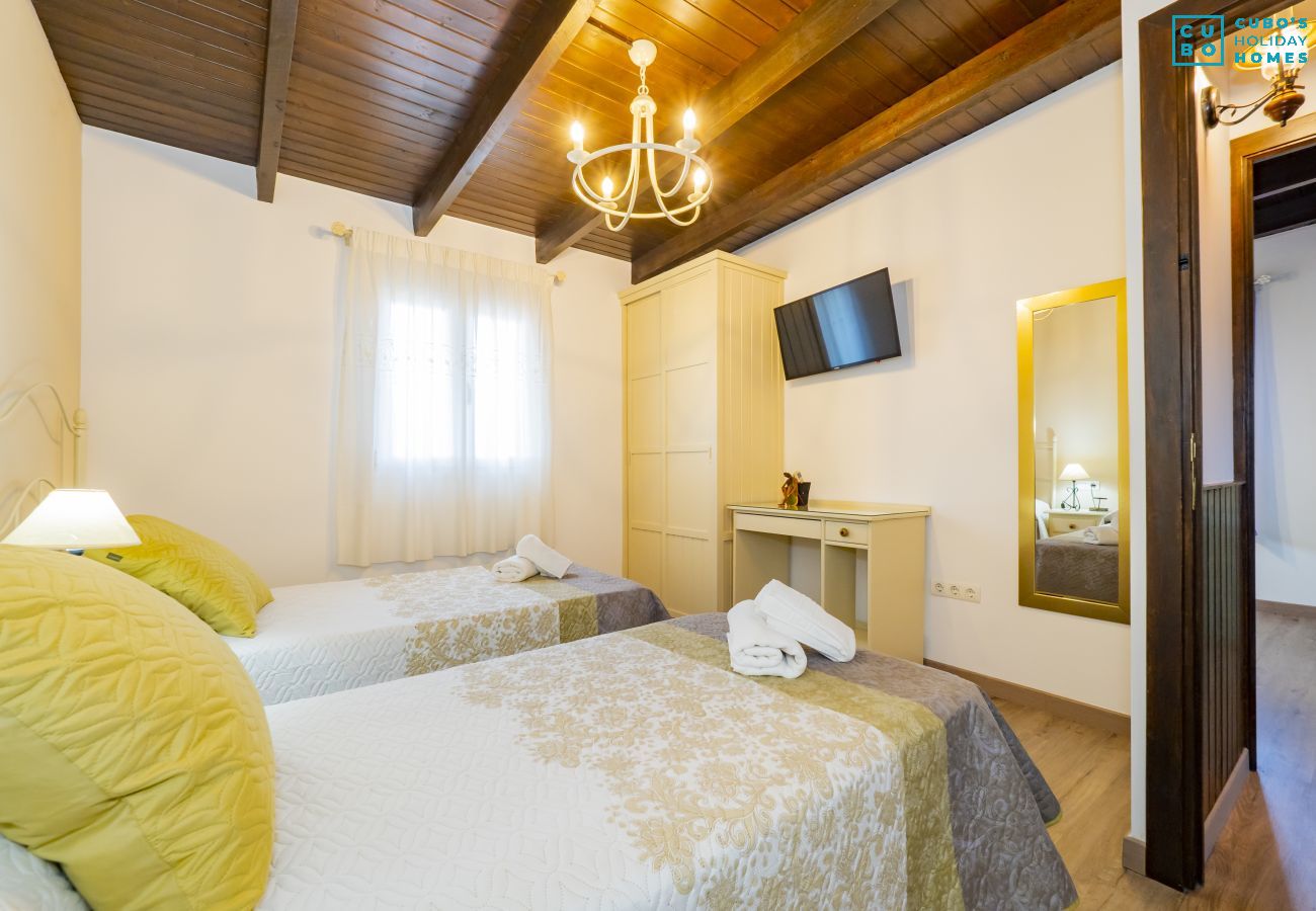 Bedroom of this rural house in Pizarra