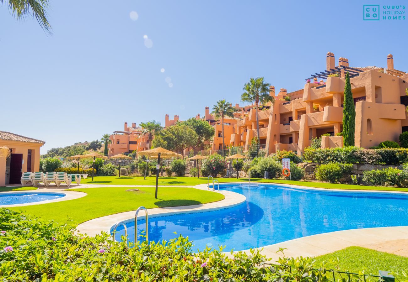 Community pool and gardens of this Apartment near Marbella