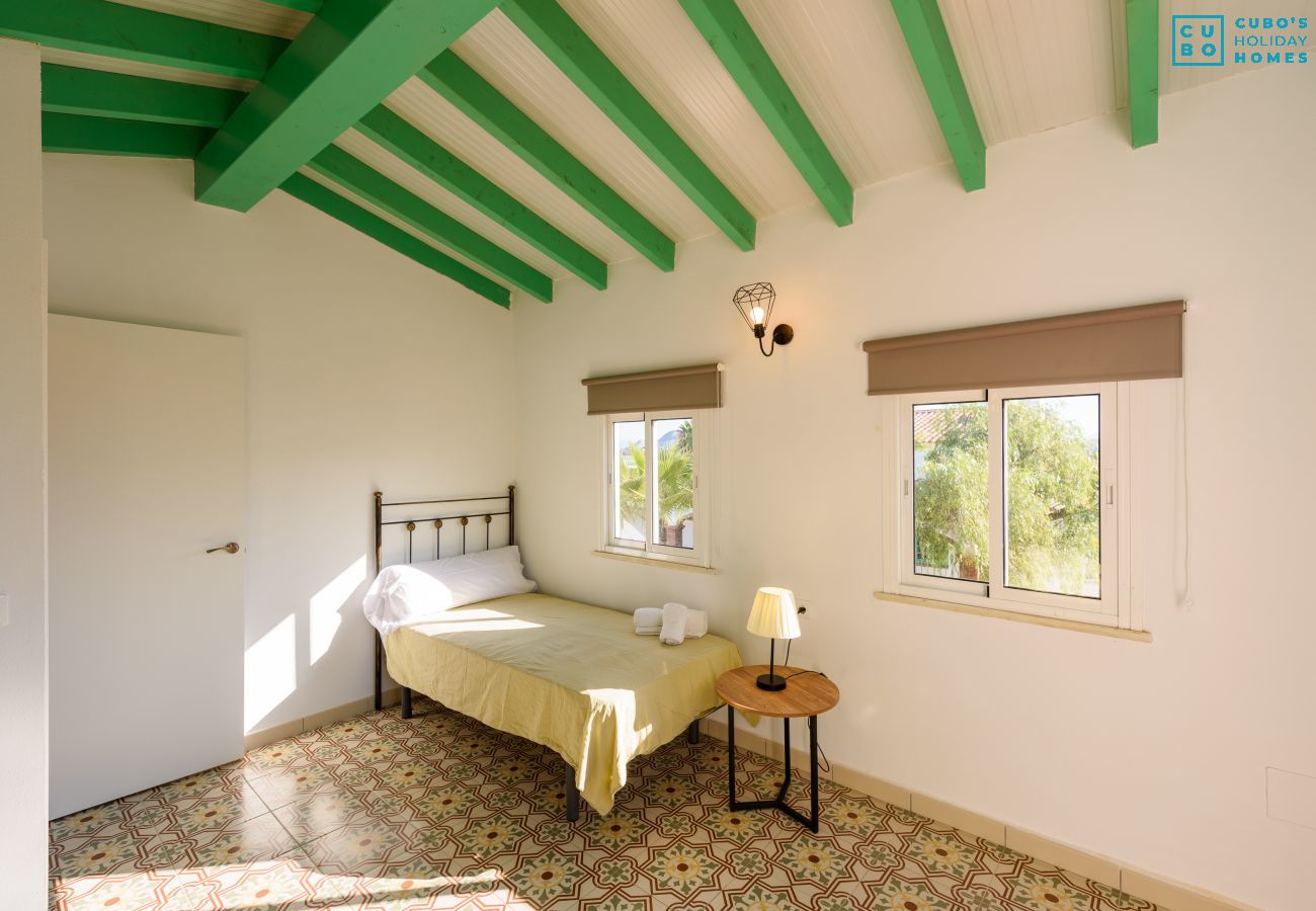 Bedroom of this rural house in Cártama