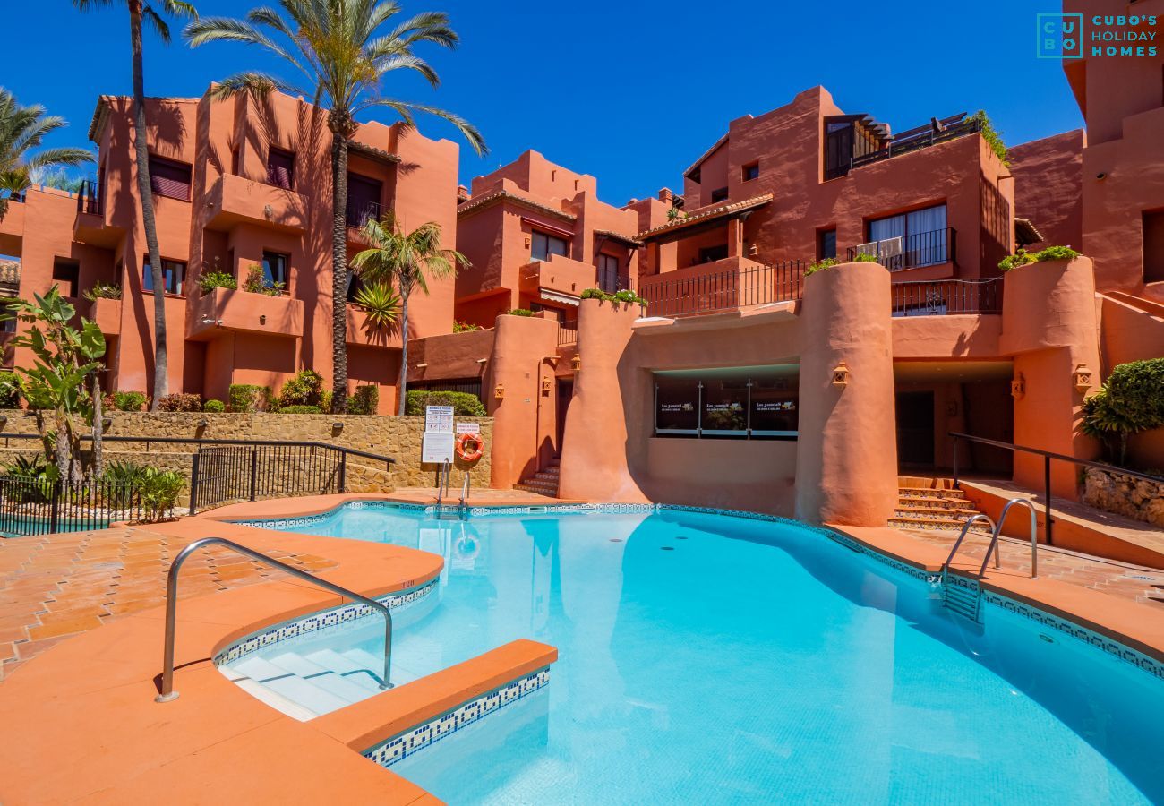 Communal pool of the apartment near the beach with parking included