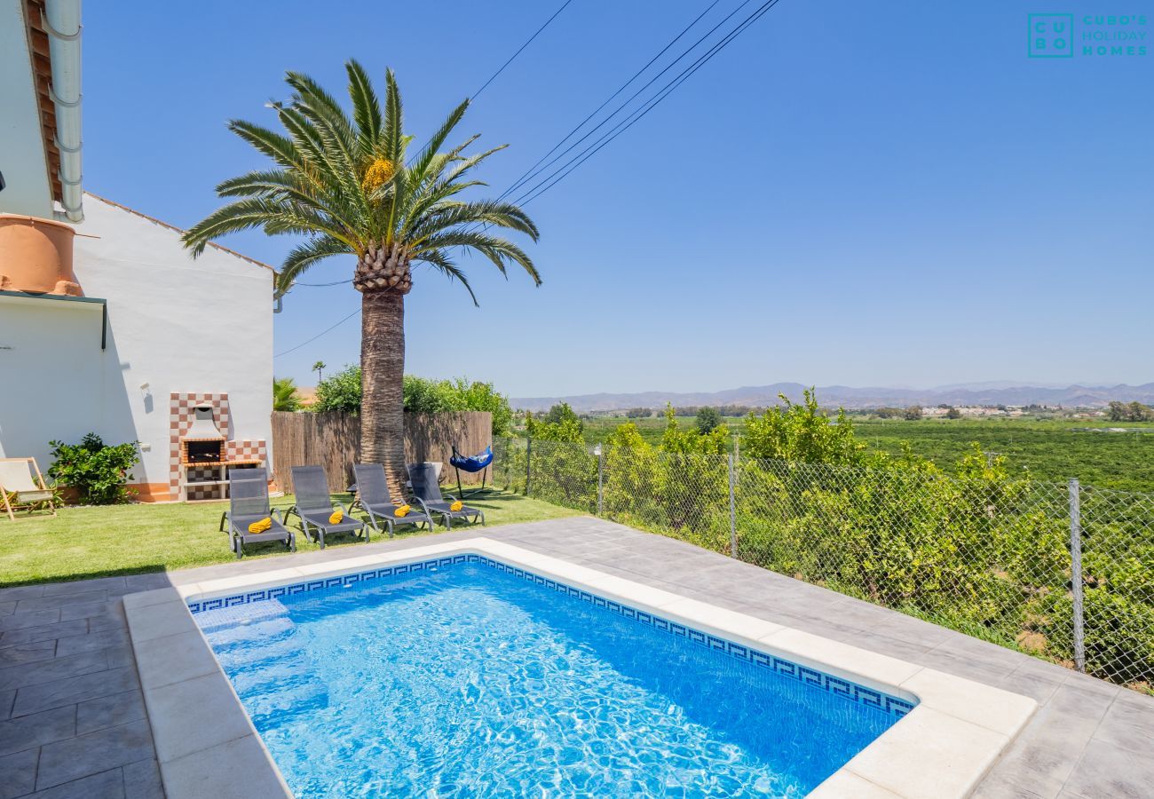 Swimming pool of the charming rural house situated in Alhaurín de la torre
