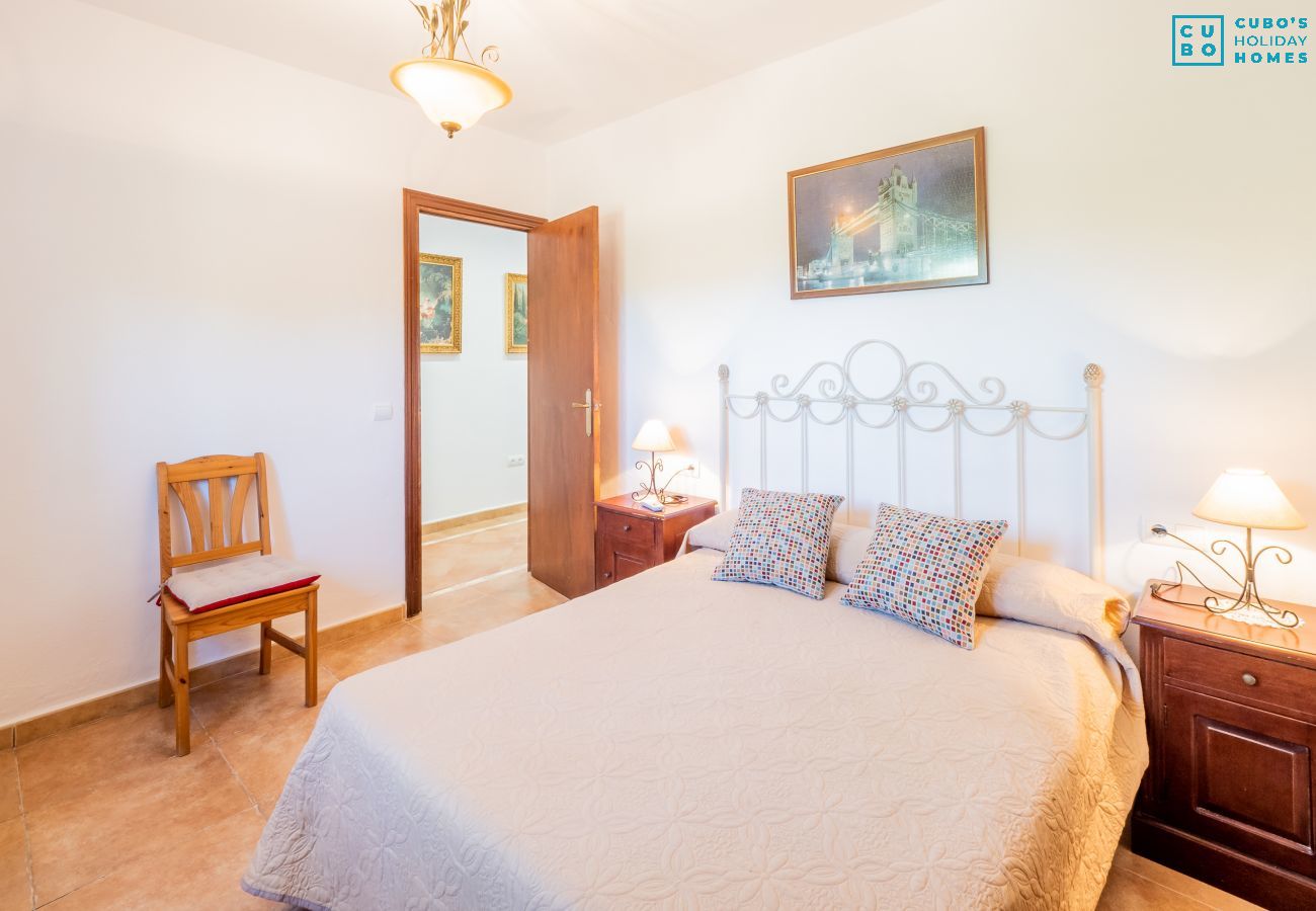 Chambre de cette maison rurale à Alhaurín el Grande