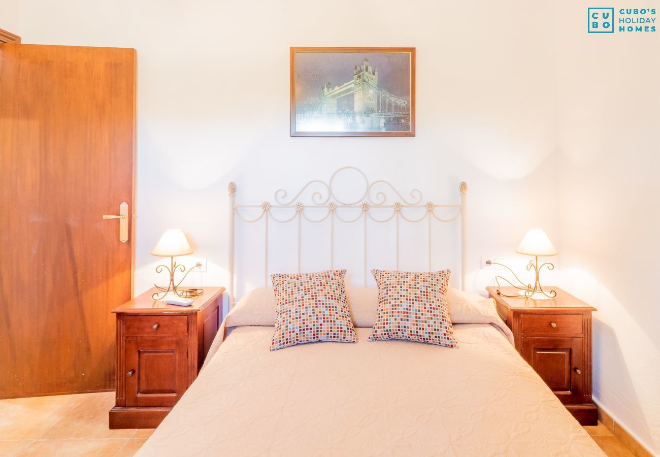 Chambre de cette maison rurale à Alhaurín el Grande